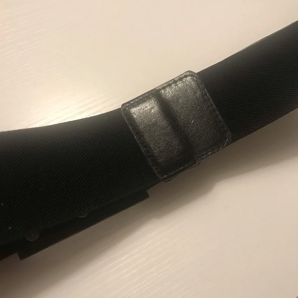 Cool black textured belt with beveled glass mirrored large buckle